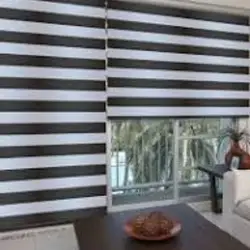 Venta e instalación de persianas enrollables sheer elegance tipo dual shade en Puebla. Persianas modernas con franjas traslúcidas y opacas para control gradual de luz natural en salas y espacios residenciales. Grupo Orvi - Fábrica de persianas enrollables premium en Puebla, Angelópolis, Cholula y zona metropolitana.