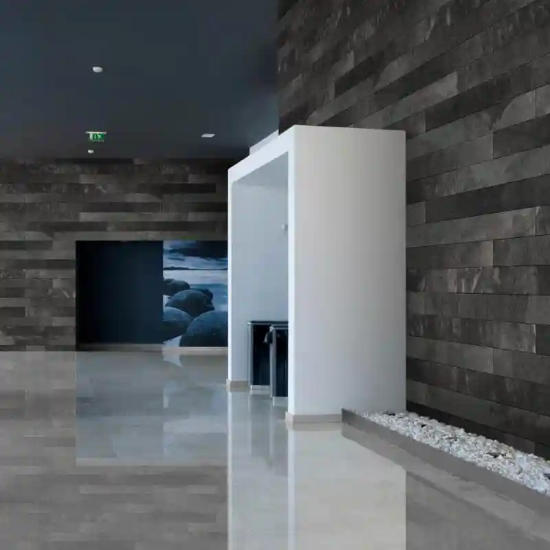 Instalación de revestimiento de piedra flexible en pared interior en Puebla, servicio de Grupo Orvi