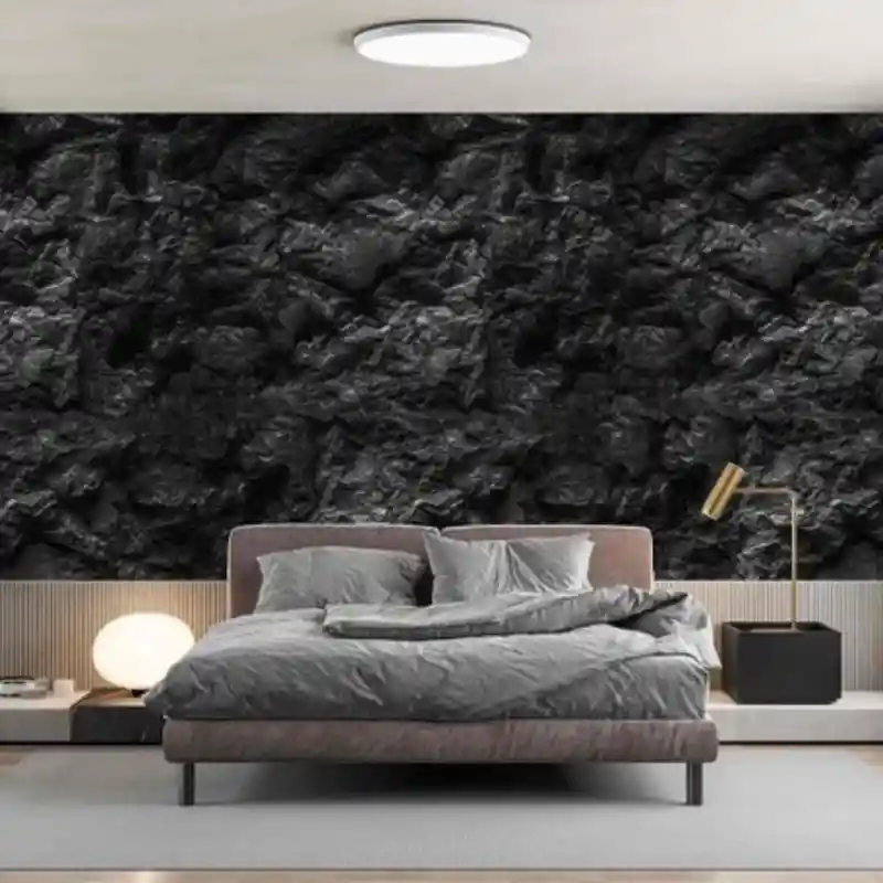 Muro decorativo con piedra flexible para interiores modelo Stone Marbled Black instalado en recámara premium, proyecto de Grupo Orvi en La Vista Country Club, Puebla